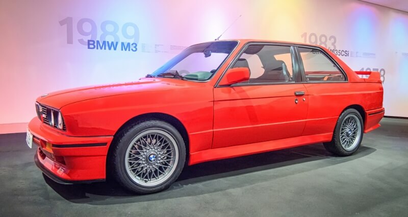 A red 1989 BMW E30 M3