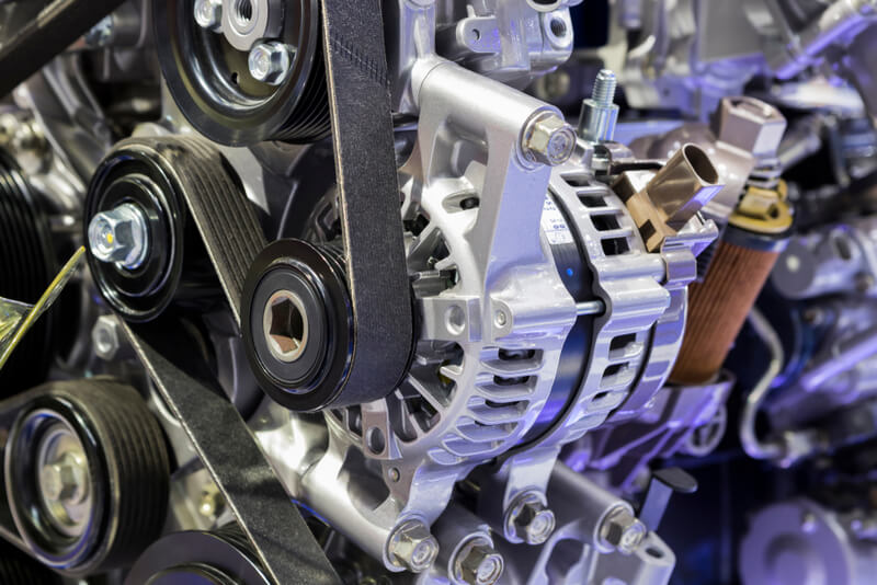 Alternator with drive belt