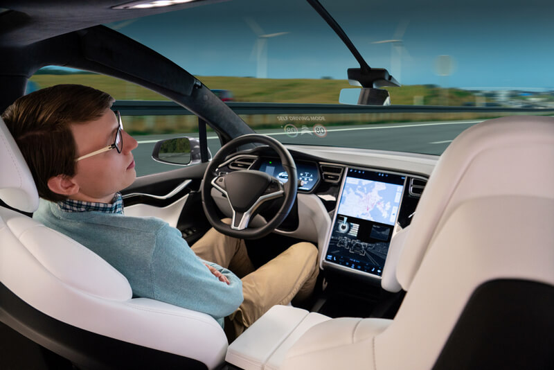 Self-driving Tesla while the driver is sleeping