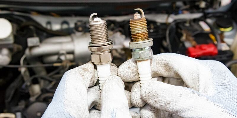 old and new spark plug comparison