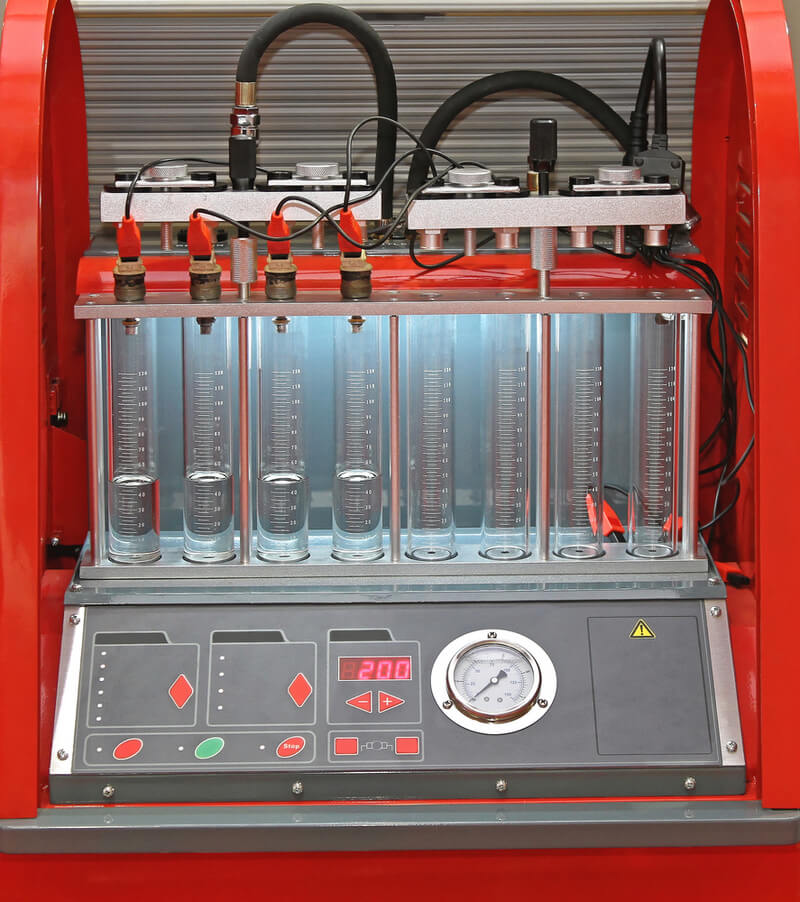 Fuel injector testing and cleaning device
